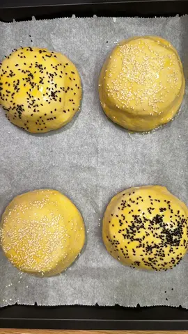 Stop eating burgers outside — once you make this at home, you’ll want to repeat it over and over again! And don’t worry the meat does NOT stay raw — it cooks beautifully inside, staying incredibly soft and juicy. Honestly, this is the best burger I’ve ever eaten in my life!  For the Meat Filling: 	•	500 g ground beef 	•	1 teaspoon cumin 	•	1 teaspoon coriander powder 	•	½ teaspoon black pepper 	•	1 teaspoon salt ⸻ For the Dough: 	•	500 g flour 	•	1 teaspoon dry instant yeast 	•	2 teaspoons sugar 	•	1 egg 	•	1 teaspoon salt 	•	2 tablespoons melted butter 	•	150 ml warm water 	•	80 ml warm milk ⸻ For Caramelized Onions: 	•	2 onions (thinly sliced) 	•	2 tablespoons soy sauce 	•	1 tablespoon teriyaki sauce 	•	1 tablespoon sweet chili sauce 	•	½ teaspoon salt ⸻ For the Filling (per burger): 	•	3 slices cheddar cheese 	•	1 small pickled cucumber (sliced) 	•	Fried potatoes — I cut the potatoes into rings, sprinkled them with sweet paprika, salt, and a little oil, then air-fried them at 170°C for 15 minutes. 	•	Burger sauce — or make your own using mayonnaise, ketchup, mustard, and garlic powder or minced garlic ⸻ Preparation 1. Prepare the Dough Combine all the dough ingredients in a bowl and knead until smooth. Cover the dough tightly so no air gets in, wrap it with something warm, and let it rise for about 1 hour, until doubled in size. ⸻ 2. Prepare the Meat Filling Add all spices to the ground beef and mix thoroughly. ⸻ 3. Caramelize the Onions Cook the sliced onions in a pan. Add soy sauce, teriyaki sauce, sweet chili sauce, and salt. Cook until soft, glossy, and caramelized. ⸻ 4. Assemble the Burgers Once the dough has risen, divide it into 5–6 balls (about 150 g each). Roll each ball out and place it inside a deep bowl or mold, as shown in the video. Fold the dough over the filling and seal it well. ⸻ 5. Baking Mix 2 egg yolks with 1 tablespoon oil and brush the tops. Sprinkle sesame seeds or black seed if desired. Bake at 160°C for 30 minutes. #burger #burgerrecipe #doughrecipe #foryou #rashidamusayeva   