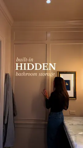 There’s a secret hiding in our bathroom walls…  The push-open doors disguised within the moulding gave us all the extra bathroom storage we needed while giving the space a clean, minimal look.