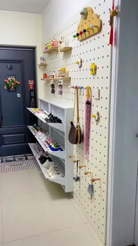 A slim shoe cabinet paired with a pegboard is a perfect match—both practical and aesthetically pleasing! #shoecabinet #slimshoecabinet #pegboard #pegboardshelf 