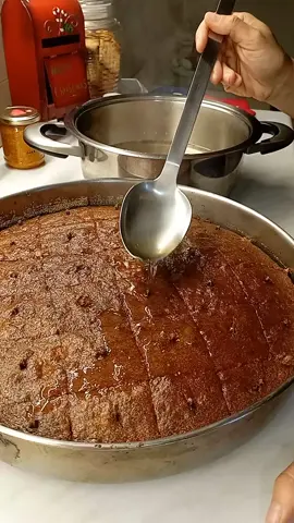 Την παράδοση και τις αξίες τις ακολουθώ πάντα πιστά! Όταν ακόμα μετρούσαν, ζύγιζαν τα υλικά σε δράμια και πόσο κάνει η οκά αυτή την καρυδόπιτα την έφτιαχνε και την έψηνε η γιαγιά μου στον ξύλοφουρνο. Με τα υλικά και τα άλευρα εκείνης της εποχής που καμία σχέση δεν έχουν με τα τυποποιημένα του σήμερα! Παρόλα αυτά η αξία και η νοστιμιά δεν έχασε πουθενά! Υλικά:  *1 φλιτζάνι λάδι  *2 φλιτζάνια καρυδόψιχα  *1 φλιτζάνι αλεύρι γλχ *1 φλιτζάνι σιμιγδάλι  *2 φλιτζάνια ζάχαρη κρυσταλλική  *1 φλιτζάνι φρυγανιά  *1 φλιτζάνι γάλα φρέσκο  *1 μπεικιν παουντερ (φακελάκι) *1 κτγ σόδα  *1 κτσ κανέλα  *1 κτσ γαρίφαλο  *1 σφηνοποτηρο κονιάκ  *6 αυγά  Σιρόπι: *2 1/2 ποτήρια νερό  *2 1/2 ποτήρια ζάχαρη  *1 ξύλο κανέλας  *2 φέτες λεμόνι 🍋  *1/2 κτγ γαρίφαλο  *πρόκες γαρίφαλο  ( Η δοσολογία αυτή είναι για ένα μεγάλο ταψί 38× 38 εκατοστά) Διαδικασία : Χωρίζουμε τους κρόκους από τα ασπράδια. Χτυπάμε στο μίξερ τους κρόκους με την ζάχαρη μέχρι να αφρατεψουν καλά. Ρίχνουμε μέσα χλιαρό το γάλα. Το λάδι ,κονιάκ και ανακατεύουμε ελαφρά με μια μαριζ. Ανακατεύουμε όλα τα στερεά υλικά μαζί. Αλεύρι, σιμιγδάλι, φρυγανιά, μπαχαρικά, σόδα και μπεικιν παουντερ. Ρίχνουμε τα στερεά στο μείγμα των κρόκων να ομογενοποιηθούν. Χτυπάμε τα ασπράδια μαρέγκα και ενσωματώνουμε με το υπόλοιπο μείγμα. Λαδωνουμε ένα ταψί και ρίχνουμε σιμιγδάλι ή φρυγανιά στον πάτο για να μην κολλήσει η καρυδόπιτα. Ψήνουμε σε προθερμασμενο φούρνο στους 170°✓ - 180°✓ για 40'-45' λεπτά αναλόγως τον φούρνο. Αφήνουμε να κρυώσει και χαρακωνουμε σε τετράγωνα κομμάτια. Βάζουμε σε κάθε κομμάτι στο κέντρο πρόκες γαρίφαλο. Φτιάχνουμε το σιρόπι. Βράζουμε όλα τα υλικά για το σιρόπι για 5' λεπτά. Σιροπιαζουμε κρύα καρυδόπιτα, καυτό σιρόπι. Εδώ θέλω την προσοχή σας! Με μια κουτάλα θα σιροπιασετε το γλυκό σιγά -σιγα κάθε κομμάτι μέχρι να απορροφηθεί όλο το σιρόπι. Μην βιάστηκε, θέλει το χρόνο του για να σας είναι ζουμερη η καρυδόπιτα, αλλά όχι λασπωμένη! Καλή επιτυχία! #καρυδοπιτα #συνταγη #greekfood #Recipe #fyp 