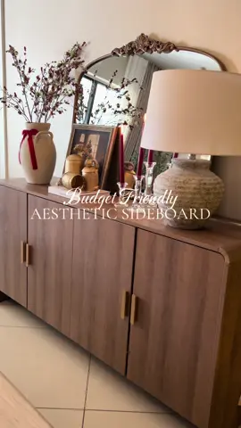 This sideboard was such an affordable find, but you’d never know it. ✨🤍. Once I added the mirror, the lamp, and a few pretty pieces, it instantly felt elevated. If you’re looking for the perfect oak wood sideboard this is the one for you! #sideboard #homedecor #affordablehomedecor #homedecoronabudget #aesthetichomedecor  Affordable home finds  Aesthetic home finds