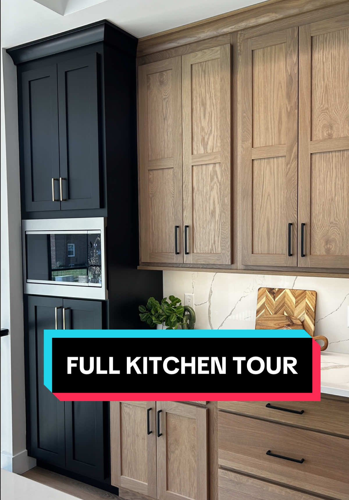 Fresh new feature just hit the Village Home Stores blog take a video tour of the space right here. Shown: Koch cabinetry in the Savannah flat panel door in a combination of White Oak Wheat and Black painted finishes. #villagehomestores for @Builtqc #newhome #kitchen #kitchendesign #whiteoakcabinets 