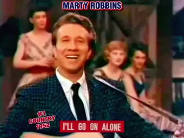 🇺🇸 Marty Robbins - I’ll Go On Alone #1952 traditional country, classic honky-tonk  🎵 Background: 	•	Released: October 1952 	•	Label: Columbia Records 	•	Writer: #Marty #Robbins himself 	•	Significance: This was Robbins’ first major hit and helped establish him as a prominent #country artist in the early 1950s. It’s considered a classic honky-tonk ballad, marking his emergence in the Nashville scene. 🎸 Song Style & Themes 	•	Genre: Country / Honky-Tonk 	•	Style: Solo vocals with steel guitar, fiddle, and upright bass backing — typical of early ’50s country. 	•	Themes: Heartbreak and resilience; Robbins sings about moving on alone after a romantic split, expressing sorrow but determination. 	•	Vocal Performance: Smooth and emotive; showcases Robbins’ signature storytelling style. 📈 Chart Performance 	•	Billboard Country & Western Best Sellers: #1 in early 1953 	•	Significance: His first chart-topping hit; set the stage for over a decade of successful singles in the country charts. 📺 Music Video / Performances 	•	No official music video (pre-MTV era). 	•	Robbins performed this song on the Grand Ole Opry in the early 1950s, though the exact date is unverified. 	•	Some archival video footage exists online (YouTube) showing Robbins performing it live, sometimes attributed to Opry/WSM recordings. 🌟 Legacy 	•	I’ll Go On Alone is recognized as Robbins’ breakthrough and is considered a classic early country recording. 	•	It influenced the honky-tonk and Nashville sound of the 1950s. 	•	The song helped establish Robbins as a singer-songwriter capable of crafting heartfelt, relatable country narratives.