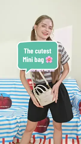 Meet Mirara Handbag, the cutest mini bag for your everyday vibe! ✨ Desainnya clean & chic, scarf-nya sweet banget, dan warnanya soft pretty yang gampang dipair sama outfit apa pun. Plus, bisa dipakai slingbag—so praktis & feminine! #Enjiid #BanggaPakeenji #TasWanita  #WIBGAJIAN #PromoGuncang1212 