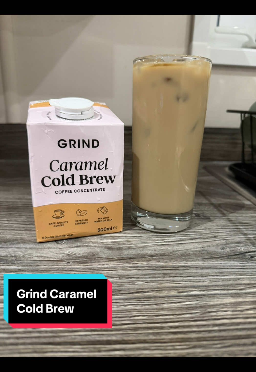 Description INSTANT BARISTA ICED COFFEE: Make smooth, café-quality caramel iced coffees at home in seconds with Grind's naturally sweet caramel cold brew concentrate. CAFÉ QUALITY: Made using 100% Arabica speciality-grade coffee, carefully cold-brewed for a seriously smooth texture and professional taste. No sugar, no milk, just great cold brew coffee. ESPRESSO STRENGTH: Each 500ml carton contains 8 double shot servings, providing natural rich taste and great value. VERSATILE USE: You can use this concentrate for all of your favourite iced coffees, as well as espresso martinis. Simply mix 60ml concentrate with 60ml water or milk (or both for a longer coffee. ENVIRONMENTALLY RESPONSIBLE: All Grind coffee is ethically sourced from sustainable farms, our cold brew cartons are fully recyclable, and we're proudly B Corp certified. One seriously small carton makes up to 8 seriously smooth coffees. 500ml / 8 servings @Grind  #grind #icedcoffeeathome #coldbrew #icedcoffeelover #caramelicedcoffee 