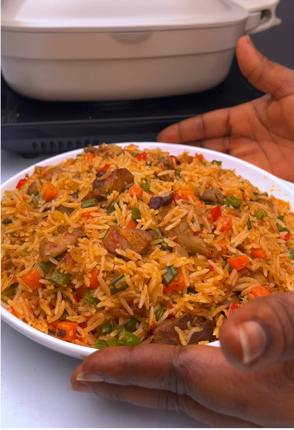 This delicious and inviting vegetable Chicken rice is what you family need this festive season. 🔹Seasoning the chicken Black pepper  White pepper  Garlic powder  Ginger powder  Aniseeds powder  Onion powder  Paprika powder  Salt  Cooking oil  Chicken seasoning  🔹Ingredients for pepper mix  Sweet pepper Green and red habaneros Onion Garlic One shrub of spring onion Aniseeds powder 🔹seasoning the bones Ginger powder Chicken seasoning Shrimp seasoning Pepper mix Salt oil 🔹Vegetables used  Carrots Onions Green beans Red bell pepper Yellow bell pepper Green bell pepper #christmas #christmasrecipe #ghanatiktok🇬🇭 #goodfood #rice 