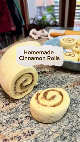 Recipe Below! ⬇️ These yummy cinnamon rolls are a hit every time I serve them. Perfect for the holidays! It’s so fun to spread the butter and sprinkle the cinnamon and brown sugar and then roll up the dough. I cut the rolls with a piece of thread just like my mama taught me. I hope y’all enjoy this recipe with your family! 💕 Homemade Cinnamon Rolls  Dough: 2 cups lukewarm milk 4 tbsp butter, softened 1/4 cup white sugar  2 tsp salt 1 1/2 tbsp dry instant yeast, 2 - 1/4 oz packets  2 eggs 5-6 cups flour  Filling: 1 stick softened butter  2 tbsp ground cinnamon, an even sprinkle  1 cup brown sugar  Icing: 1 stick butter (or 4 tbsp butter and 4 oz cream cheese)  2 tsp vanilla extract 4 tbsp milk, and more if needed 2 lb. bag of powdered sugar Directions: Cinnamon Rolls: In a small pot on the stove, warm the milk to lukewarm. Pour in a large mixing bowl and add the butter, sugar, salt, and sprinkle the yeast on top. Add the eggs and gradually add the flour as you stir it altogether. Keep adding flour until too thick to stir and then start kneading. Add flour and knead for about 5 minutes to make a smooth elastic dough.  Cover and let rise for about an hour or until doubled in size.  Oil your hands with olive oil and punch down the dough. Oil the bowl, flip the dough over in the bowl so the smooth side is on top, and let the dough rise again for about an hour or until doubled in size. Preheat oven to 400 degrees Fahrenheit.  Place risen dough on a floured surface and use a rolling pin to roll it into a large rectangle. Spread the stick of softened butter evenly over it. Evenly sprinkle a generous layer of cinnamon on top of the butter. Spread the brown sugar evenly on top. Roll the dough rectangle evenly into a long log. Take a piece of thread and cut the log into 1” slices. Place the slices in an oiled pan, cover with a cloth, and let rise for about 15 minutes.  Bake for 15 minutes in preheated oven. Remove from oven and let cool.  Icing: In a mixing bowl beat butter with mixer and then add the rest of the ingredients and beat till smooth. Add powdered sugar slowly to avoid making a mess. Use as much milk as needed to get to the right consistency.  Ice the cooled rolls and enjoy!  Yield: About 18-20 rolls  Cinnamon Roll Icing: 1 stick butter (or 4 tbsp butter and 4 oz cream cheese)  2 tsp vanilla extract 4 tbsp milk, and more if needed 2 lb. bag of powdered sugar In a mixing bowl beat butter with mixer and then add the rest of the ingredients and beat till smooth. Add powdered sugar slowly to avoid making a mess. Use as much milk as needed to get to the right consistency.  #cinnamonrolls #homebaker #yum #Recipe #tradition 