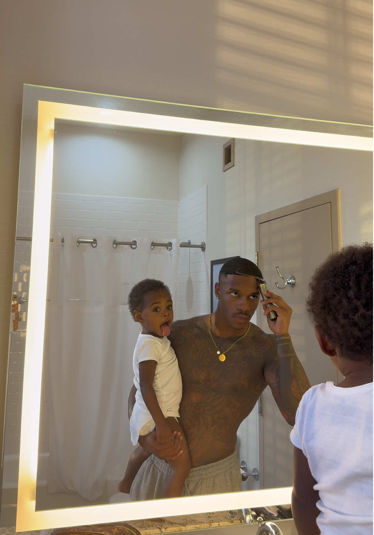 He loves looking in the mirror 😂 still waiting for him to let me cut his hair 🤣🤣