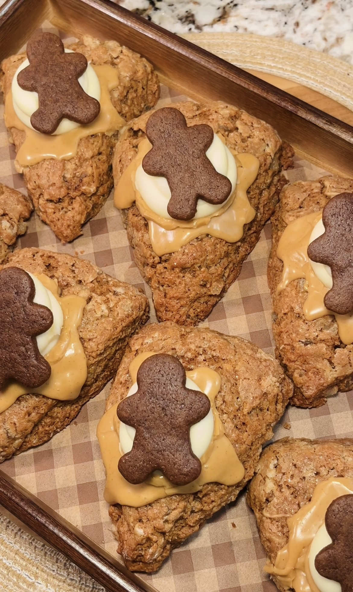 Gingerbread Molasses Scones 🤎🎄 its safe to say that its TIIIIMMMEEEE 😆 lets kick of the holiday vibes with these delicious gingerbread flavored scones!  as always, a full detailed recipe will be posted on my website soon. Link in bio!  Makes 8 Ingredients Gingerbread Scones: * 300 g all purpose flour, plus more for shaping * 110g brown sugar  * 1 tablespoon baking powder * 1/4 teaspoon baking soda * 1 1/2 tsp ground cinnamon * 2 tsps ground ginger * 1/2 teaspoon salt * 112 g unsalted butter, cold and shredded * 1 tsp Vanilla * 100g molasses  * 1 Large egg cold, beaten * 120 g buttermilk, cold * 100g crystalized candied ginger, chopped * heavy cream for brushing * course sugar for sprinkling  Spiced Molasses Glaze: * 100g Powdered Sugar * 10g molasses  * 25g milk * ¼ tsp Cinnamon * pinch Nutmeg Cream Cheese Frosting (optional): * 60g unsalted butter  * 150g powdered sugar * 85g cream cheese  * 1/2 tsp vanilla extract Bake at 375F for about 25 minutes  #gingerbread #christmasbaking #christmas2025 #bakingrecipe #christmas 