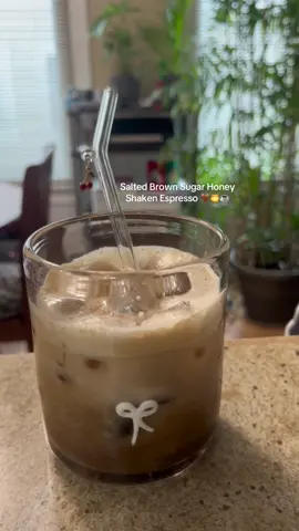 salted brown sugar honey shaken espresso! 🤎🍯☕️ recipe from: @Rafa Coffee  shake cup - 1 tbsp brown sugar ( I used dark brown sugar) - pinch of sea salt - 1 tbsp honey @Nature Nate's  - 2 shots of espresso ( I used @Who’s_Brew & pourcityrosters Kivu Dark roast espresso) note: Milk Chocolate, Nutmeg, Maple  check out Whosbrewshop.com! there coffee amazing check them out!  - and ice and shake it and then  - pour in regular cup  - more ice and milk @@LACTAID® - cinnamon on top ( but I used @@McCormick Spicesmaple brown sugar finishing sugar)  ##whosbrewshop##saltedbrownsugarhoney##shakenespresso##saltedbrownsugarhoneyshakenespresso
