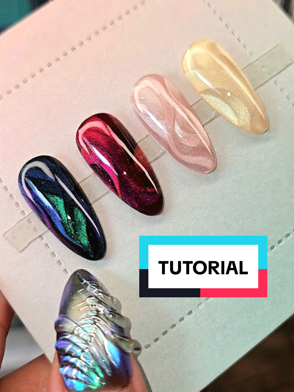 Gracias por la espera y disculpen la tardanza 🥹🤍✨️ Ya quedó el tutorial del video pasado 🤍✨️ Ayúdame viendo el video completo, dando like y compartiendo. También comenta cual color fue tu favorito, y ¿Qué diseño deberíamos recrear después? ✨️ Ojos de Gato de: @Adhere Nails @AdhereGelPolish  #nailart #cateye #nailtutorial #uñas #ojodegato 