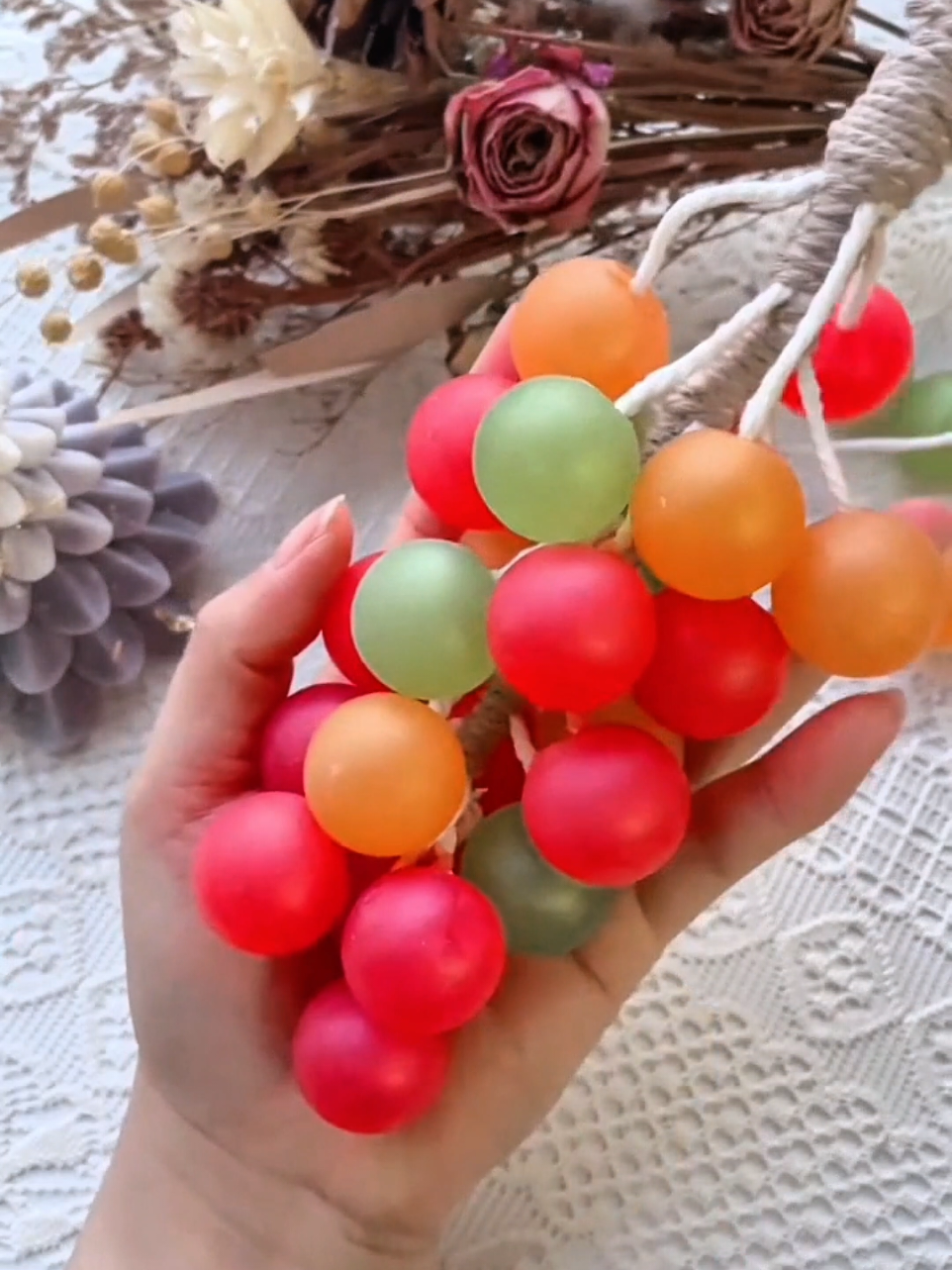 Colorful grapes… but all wax 🍇🕯️ Glossy, juicy, and so satisfying to unmold. The colors make this one pop! #grapes #candlemaking #craft #candletok #candlebusiness 