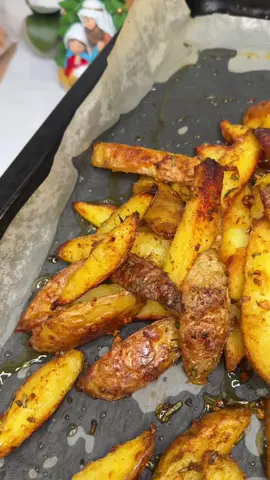 There’s something about a cold, rainy payday that makes grilled food taste even better. The kind of day where you want heat, spice, and freshness all on one plate. So I brought the sunshine to my kitchen with suya‑style chicken skewers, smoky, juicy, and packed with that bold flavour that never misses. Paired with crispy roasted potato wedges and a refreshing salad, this combo is the perfect balance of comfort and brightness. If you’ve been craving something grilled, something vibrant, something that wakes up your tastebuds… this plate is your sign.  Ingredients for chicken skewers Chicken thighs  Salt Cajun seasoning Garlic powder Ginger powder Maggi seasoning Chilli infused oil Suya spice Onions Bell peppers(Red,green,yellow) Ingredients for roasted potatoes Potatoes Salt Bicarbonate of soda Beef stock seasoning Rosemary Fresh garlic Paprika (optional)  Cooking method To make my roasted potatoe wedges. I simply washed my potatoes and cut them into the desired shapes. I went with skin on potatoes today and I put them in room temperature water and add water, beef stock cubes, salt and bicarbonate of soda (just a teaspoon) and allowed to cook for 10minutes. After I drained and fluffed in a strainer and roasted in hot oil and garnished with garlic and rosemary, salt and a little paprika. Total roast time in my oven was about 45 minutes. I flipped potatoes over every 15 minutes. You can do this in the airfryer. To make the chicken skewers. I used chicken thighs and cut it into chunks and seasoned it using salt, thyme, curry powder, Cajun seasoning, Garlic powder, ginger powder and maggi seasoning. I then proceeded to add chilli infused oil, you can use any type of oil. I also included Suya spice (it’s a special west African spice that could be purchased in African or Caribbean stores) I arranged my meat on the skewers and allow to marinate for as long as I desired. The longer the better. I then grilled on a pan for about 15-20 minutes flipping it constantly. You can choose to do this in the airfryer. #chicken #skewers #potatoes #cookwithme #fyp 