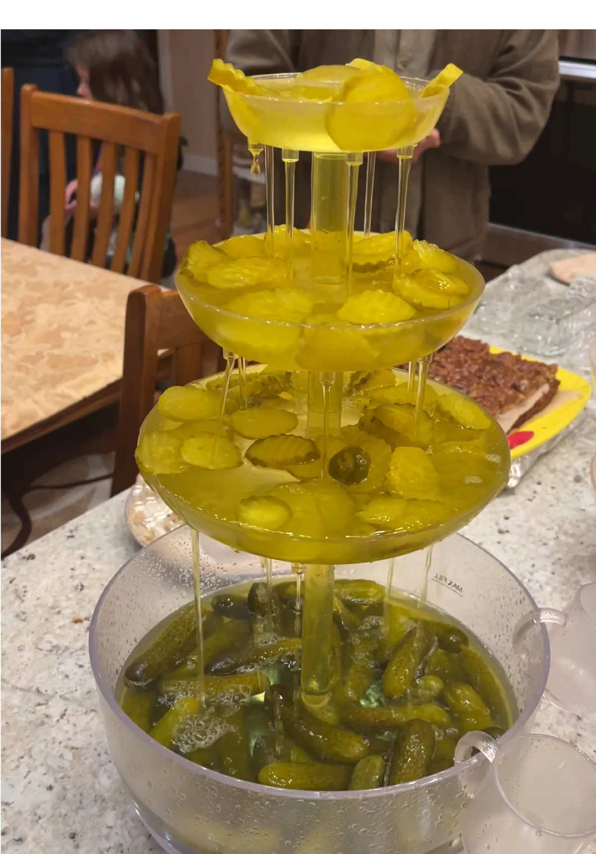 Presenting, the holiday pickle fountain. Next time I’ll be sure to find cornichon. Maybe some pickled peppers. More pickles. 🥒  Some pickle advice:  -Anytime is a good time for a pickle.  -Relish every moment you share with those you love.  -If you want life to be sweet, you have to know what sour tastes like.  -Don’t worry- in the end, everything will be just brine. #pickle #pickles #picklefountain #centerpiece @Bri Weimar | Goodbye Twenties 