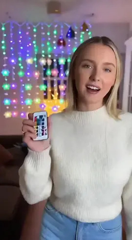 Your window needs this holiday magic! ✨ These snowflake curtain lights are stunning.