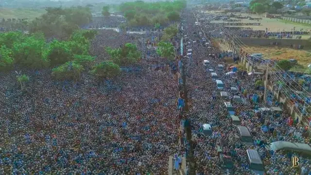 #arewa #viral #viraltiktok #nigeria #nigeria   - An aerial view of a large crowd of people gathered in a field   - An aerial view of a large crowd of people on the street   - An aerial view of a large crowd of people walking down the street   - An aerial view of a large crowd of people gathered together   - An aerial view of a large crowd of people standing around a bus   - An aerial view of a large crowd of people in the street   - An old man sitting in a chair with a white turban on his head   - An aerial view of a large crowd of people standing in front of a building   ❤️