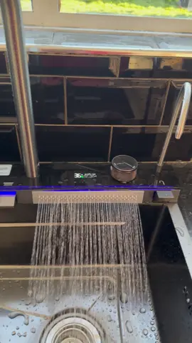 Installation of classic kitchen sink with pull out faucet 