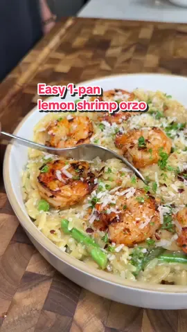 Easy 1-Pan Lemon Orzo Pasta with Shrimp in under 30 minutes! 😮‍💨 (recipe 👇🏽) Full recipe is in my meal prep magic digital cookbook! ON SALE NOW 50% off ‼️ 🤭 Macros (x3 servings): 455 calories |43g P | 54g C | 10g F Ingredients : 1 lb. raw shrimp, peeled and deveined  S&P, to taste Paprika, 1/2 tsp  Avocado oil spray, 3-4 seconds  1 shallot, finely minced  3-4 garlic cloves, minced 1  cup dry orzo pasta 2.5-3 cups lower-sodium chicken or vegetable broth Fat free half n half, 1/4 cup  Zest and juice of 1 lemon Asparagus bunch, chopped Parmesan cheese, 2-3 tbsp 1 Tbsp. butter  Garnish (optional): Chopped parsley  Chili flakes  Instructions: 1. Season shrimp with salt, pepper, and smoked paprika 2. In a pan, on medium high heat, spray avocado oil then sear the shrimp and cook until golden brown and cooked through, about 2-3 minutes per side. Remove shrimp and set to the side. 3. In the same pan, turn heat to medium low, add shallots and minced garlic and sauté until fragrant, about 1-2 minutes  4. Stir in orzo pasta and let it toast for 2-3 minutes, stirring occasionally. 5. Gradually add broth to the orzo, stirring often, until the orzo is cooked and creamy, about 10-15 minutes. Add more broth as needed to keep the orzo from sticking. 6. Add lemon juice+zest, half n half, Parmesan cheese and the asparagus  7. Garnish parsley and chili flakes then enjoy 😍 #healthyrecipes #EasyRecipes #icekarim 