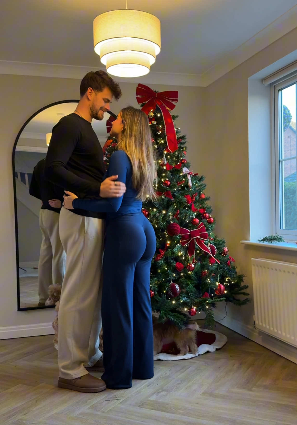 Christmas decorating time with my fiance 🤭🎄 blue set is from @Alphalete use ‘BELA’ to save! #christmas #christmasdecor #christmastime #christmasdecor #couplegoals 