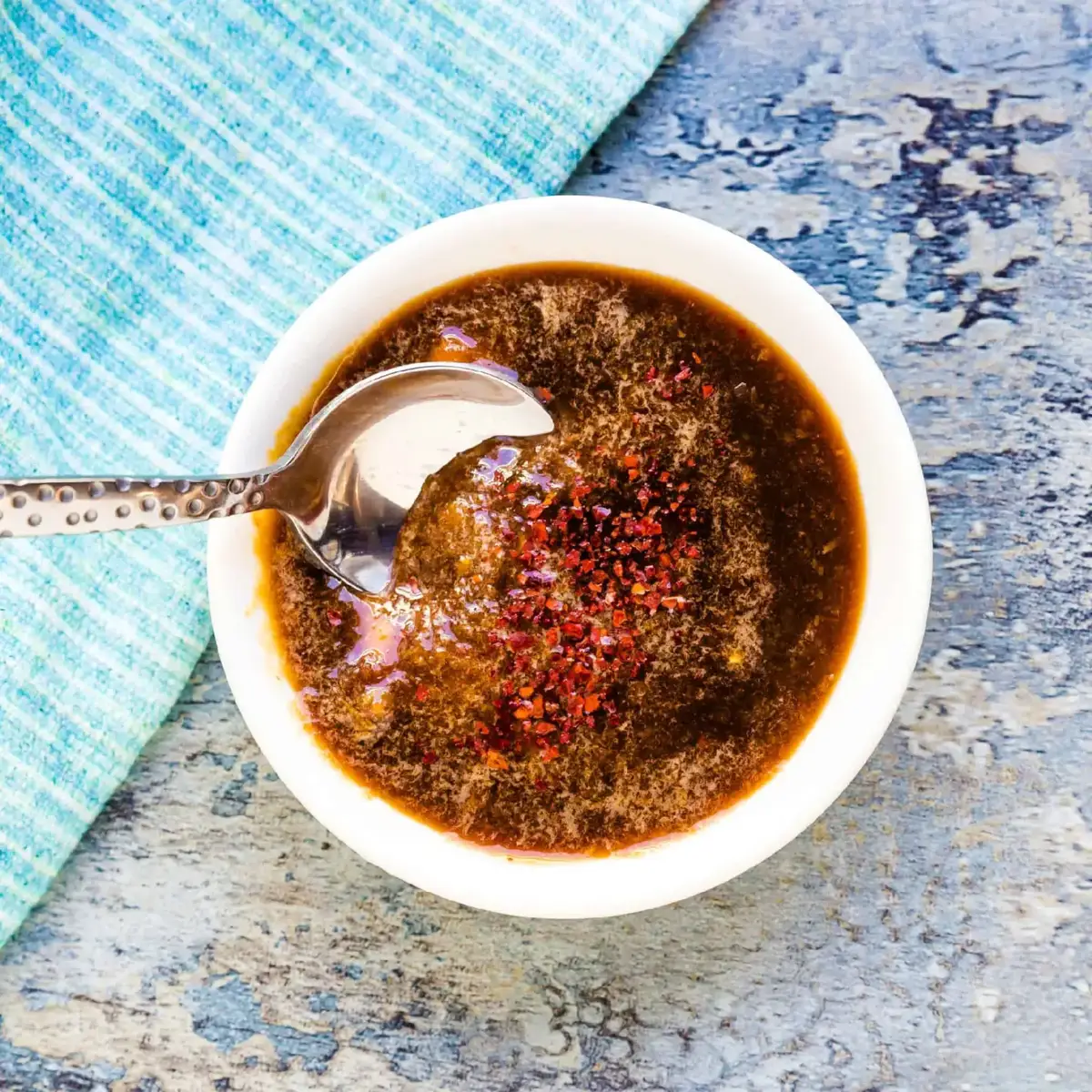 4 tbsp soy sauce (preferably dark + light mix, or just regular soy sauce) 1 tbsp vinegar 1 tbsp chili sauce (optional for heat) 1 tsp sugar 1 tsp black pepper 1 tsp sesame oil (optional but gives aroma) 6–8 cloves garlic (finely chopped) 1 tbsp oil 1 cup water 1 tbsp cornflour mixed with 3 tbsp water (slurry) Salt to taste (be careful, soy sauce is salty) 🔥 Instructions 1. Prepare the garlic base Heat oil in a pan. Add finely chopped garlic. Fry on low heat until lightly golden and fragrant. 2. Add sauces Add soy sauce, vinegar, chili sauce, sugar, black pepper, and sesame oil. Mix well and cook for 30 seconds. 3. Add water Pour in 1 cup water and let it come to a boil. 4. Thicken the sauce Add the cornflour slurry slowly while mixing. Cook until the sauce thickens and turns glossy. 5. Adjust seasoning Taste and adjust salt, pepper, or sugar as needed. ✨ Tips for Best Flavor Add a little chicken stock instead of water for restaurant taste. Add green chilies + spring onion for extra aroma. For a dipping sauce, keep it slightly thinner. For noodles/stir fry, keep it slightly thicker.