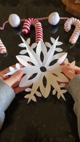 Paper snowflakes! ❄️ an easy and fun diy for Christmas/winter! My toddler hung these in her room 😂 #christmascrafts #diychristmasdecor #diychristmas #christmasdiy #diycrafts 