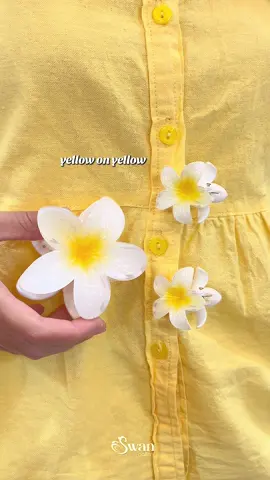 yellow outfit matching with frangipani