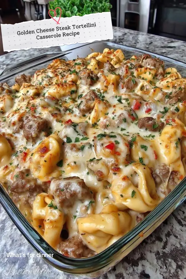 Ingredients 1 lb sirloin steak or steak tips, cut into bite-sized pieces Salt & black pepper, to taste 1 tbsp olive oil 2 tosp butter 3 cloves garlic, minced 1 tbsp all-purpose flour 2 cups milk (whole milk or 2%) 1 cup beef broth 2 cups shredded sharp cheddar cheese (or golden cheddar blend) 1 tsp Dijon mustard (optional) 1 tsp paprika 1 package (20 oz) cheese tortellini, fresh or refrigerated ½ cup shredded mozzarella (for topping) 2 tosp chopped parsley (for garnish) Instructions Preheat oven to 375°F (190°C). Season steak with salt and pepper. Heat olive oil in a skillet over medium-high heat and sear steak for 2-3 minutes per side until browned. Remove and set aside. In the same skillet, melt butter over medium heat. Add minced garlic and cook for 30 seconds. Stir in flour to make a roux and cook for 1 minute. Gradually whisk in milk and beef broth until smooth. Stir in cheddar cheese, Dijon mustard, and paprika until creamy. Cook tortellini according to package directions, slightly undercooking them. Drain and toss with a small amount of olive oil to prevent sticking. Grease a 9x13