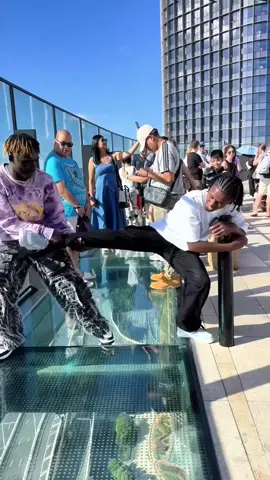 Afraid of glass bridge😂#afraid #glass #glassbridge #prank #funny #funnyvideos 