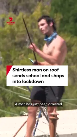 A shirtless man on a roof has sent shops and a school into lockdown at Telopea in Sydney's west. #lockdown #arrest #telopea #sydney #nswpolice