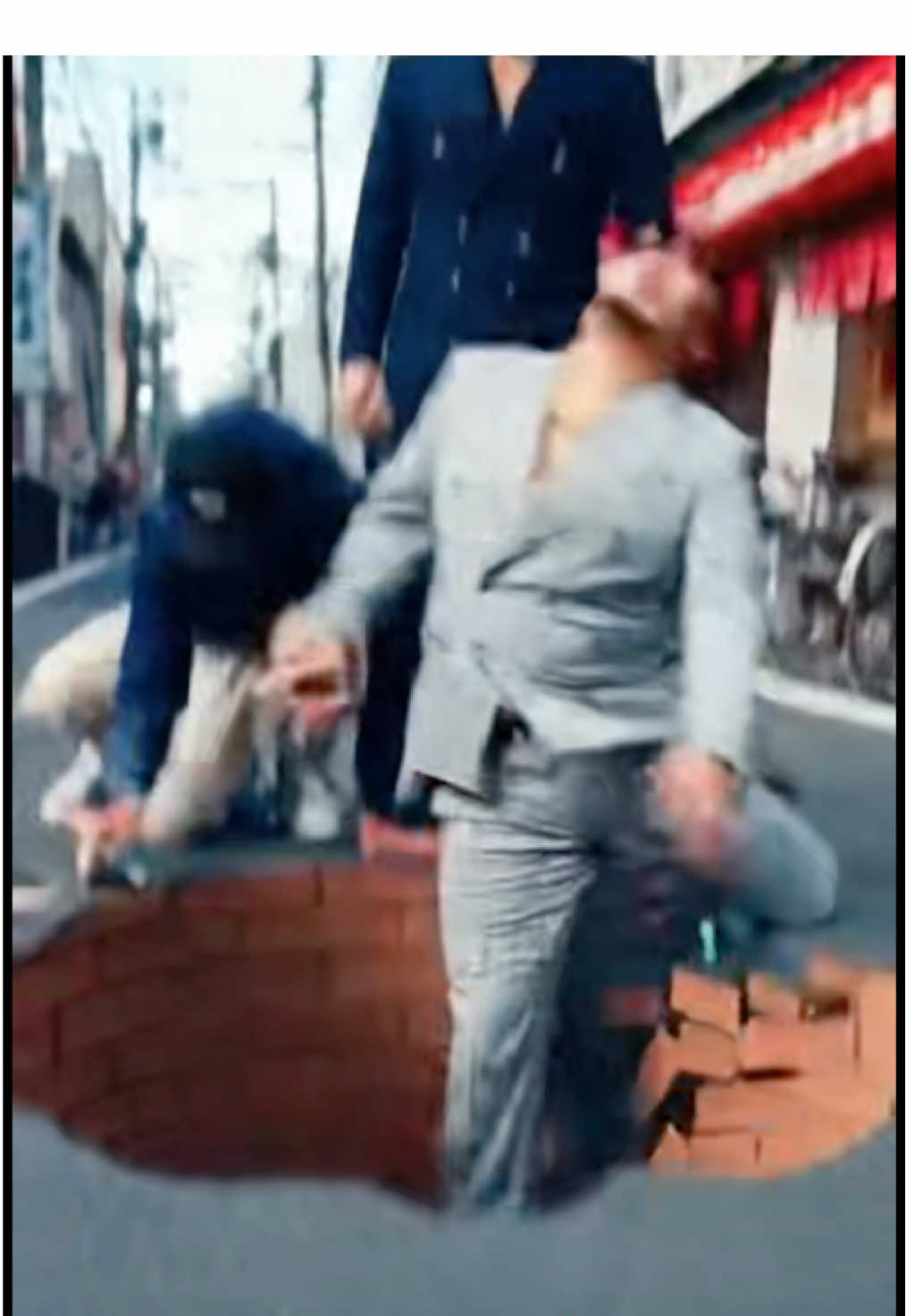 When 3D street art looks a little too real! 😱 Watch her disappear straight into the ground. Is this magic or editing? #opticalillusion #streetart #3dart #viralvideo #mindblown 