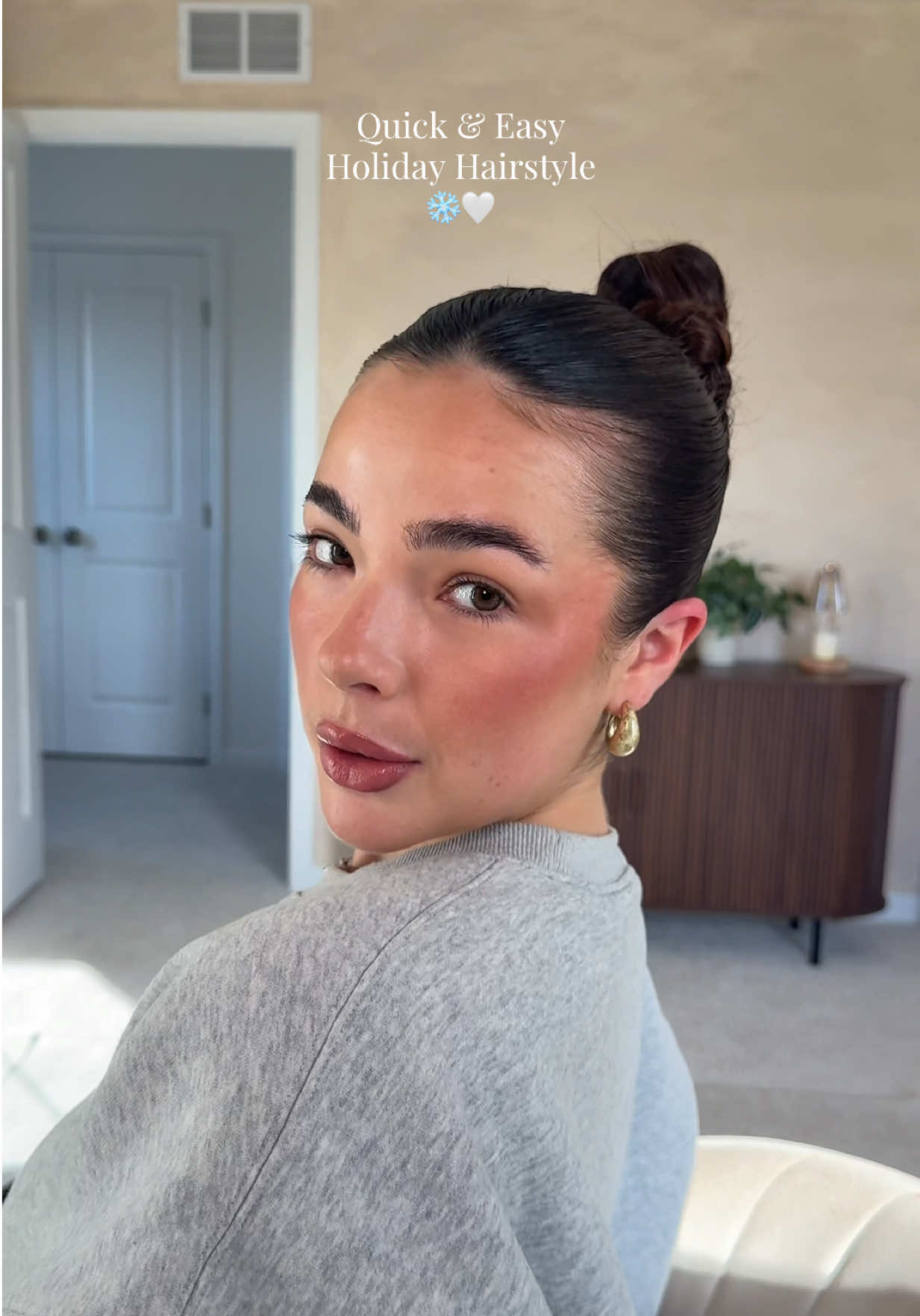 Slicked back bun hairstyle but with a fun twist ~literally~ ❄️🤍💫 #holidayhairstyle #hairstyle #hairtutorial #hairstyle #easyhairstyles  - Holiday hairstyles, slicked back bun tutorial, Hairstyles, hair inspo  - @Fenty Hair @Matrix @Olaplex 