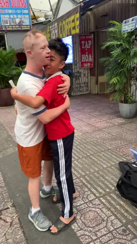 Joey visiting with his new friends in Vietnam during our morning walk#autism #downsyndrome #vietnam #bali 