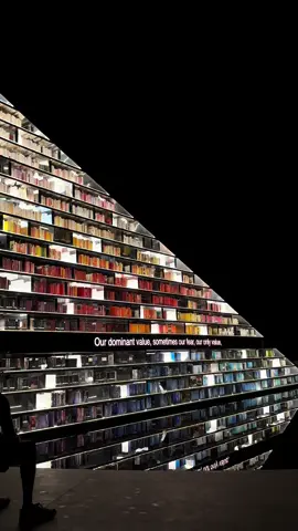 Art installation “library of us” created by Es Devlin on the sands of Miami Beach behind The Faena. The 15 meter long triangular book shelf holds 2,500 books and has a ten meter led line that streams text across its spine, while being narrated. These works of literature inspired Es Devlins work across the years. This installation holds the meaning that we are every book we’ve ever read, and is truly a writers dream. Such beautiful work.   #artbasel #faena #esdevlin #miamibeach #fyp 