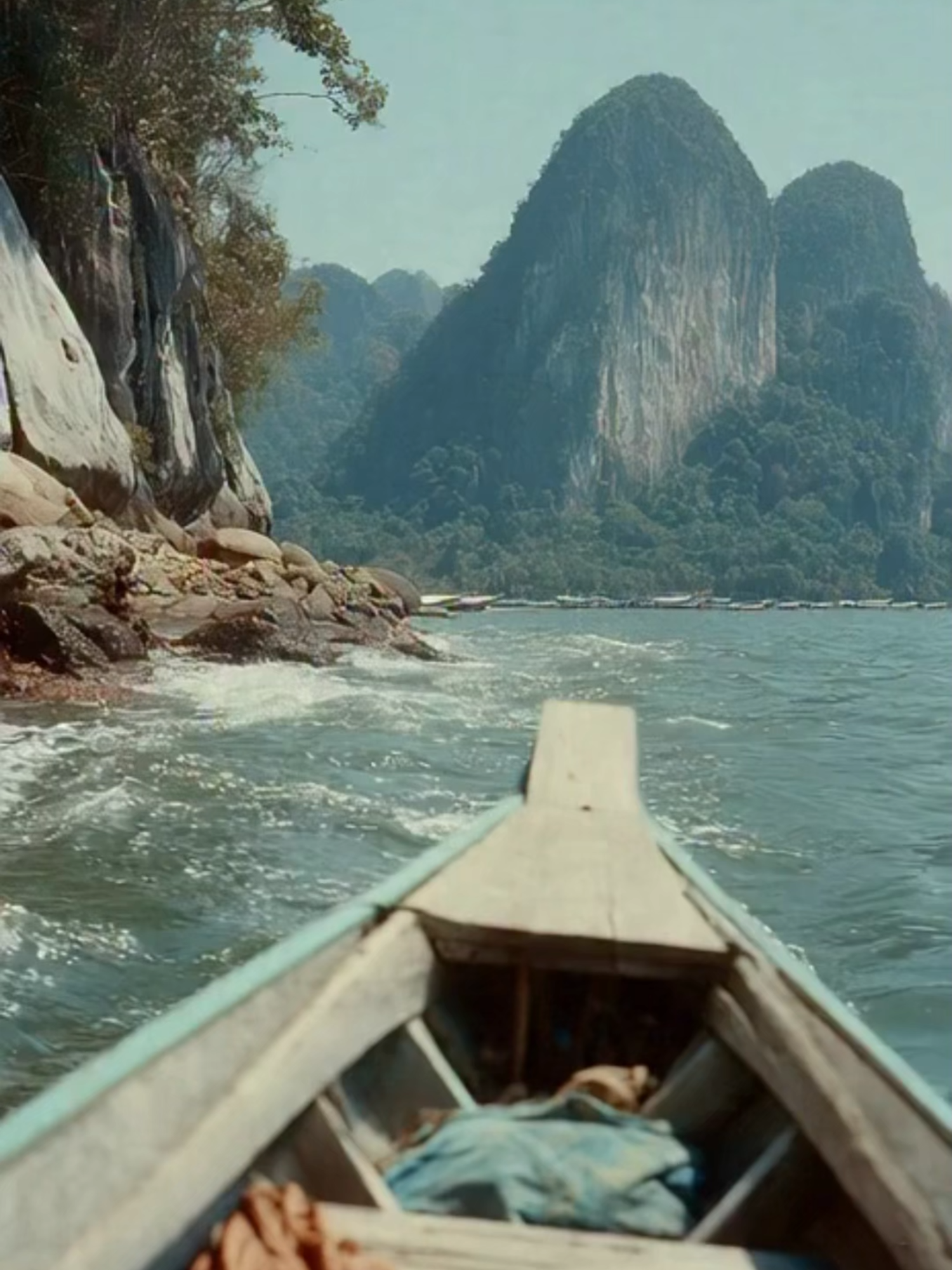 Krabi Long-Tail Boat – Emerald Waters Thailand Gliding across Krabi’s emerald water surrounded by towering limestone cliffs and tropical breeze, capturing the serene Thailand coastal escape and iconic long-tail boat magic during golden hour. #KrabiThailand #LongTailBoat #EmeraldWaters #ThailandTravel #AndamanSea