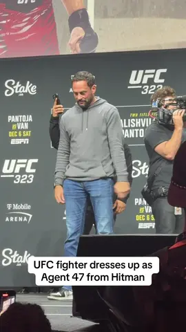 Bogdan Guskov dressed up as Agent 47 from Hitman during his UFC 323 face off with former UFC light heavyweight champion Jan Blachowicz at the UFC 323 press conference ahead of their matchup Saturday night in Las Vegas #agent47 #hitman #ufc323 