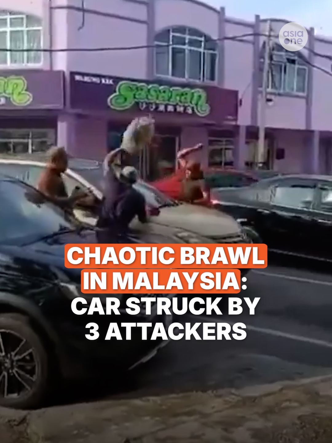 In the video, three men are seen surrounding a car outside a supermarket in Selangor. They are seen acting aggressively and hitting the car. Meanwhile, the driver, when trying to escape, smashed into another car and narrowly missed hitting the trio. All four men have been arrested following the Dec 3 incident. #MalaysiaNews #Malaysia #Supermarket #Car #Brawl
