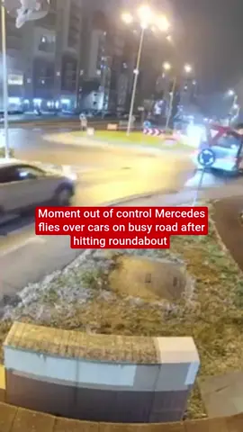 A driver made a miraculous escape after his out-of-control Mercedes hit a roundabout and flew over traffic during a medical episode. In CCTV from the scene, the car is seen being catapulted off the road at speed before sailing over the top of two cars. The driver, who officials say had fainted after a diabetic episode, was later cut free from wreckage after smashing into a roadside pole in the Romanian city of Oradea on Wednesday (3 December). The 49-year-old man was left with multiple fractures but avoided life-threatening injury. Police issued him a 1,600 lei (£270) fine and a 90-day license suspension, as investigations continue.