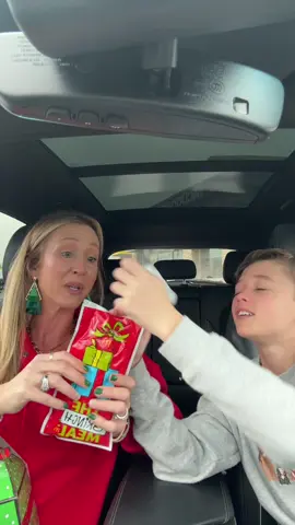 Opening the grinch socks from the @McDonald’s happy meal #grinch #mcdonalds #boymom #fyp 