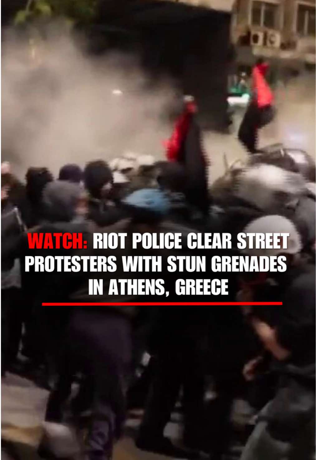 WATCH: Riot police clear protesters on a street with stun grenades in Athens, Greece. The Saturday protests marked the 17th anniversary of police fatally shooting a teenager, an incident that sparked mass riots.