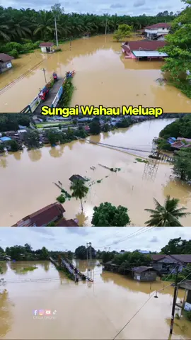 pantauan udara 7 Desember 2025, sungai wahau meluap, sehingga kendaraan roda 2 tidak dapat melintasi