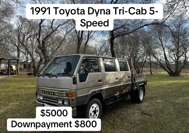 Chassis: BU870009938 106k Kilometers (~66k Miles) Shown 3.7-Liter Diesel Inline-Four Five-Speed Manual Transmission Pewter & Gray Paint Gray Upholstery Three Rows Seating For 9 Passengers Fold Down & Removable Table Drop-Down Bed Side Panels 16