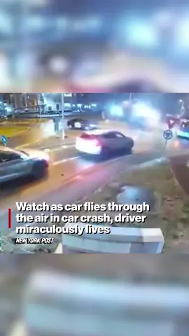 A luxury Mercedes Benz sedan went airborne and sailed over other traffic in a terrifying crash. The dramatic wreck unfolded on December 3 in the Romanian city of Oradea, where the car jumped a curb, nearly smashed into a bus and flew into the air and over other cars. Learn more at the link in bio.