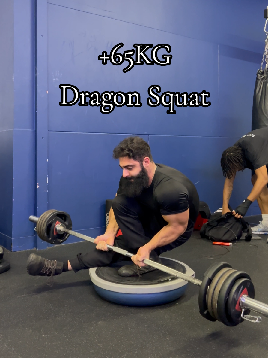 The only hard part is actually holding the weight off the floor in that half curl position - the squat is easy