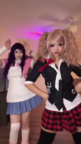 this may be mikan and junko @kora.aura ( #danganronpacosplay #junkoenoshima #mikantsumiki )