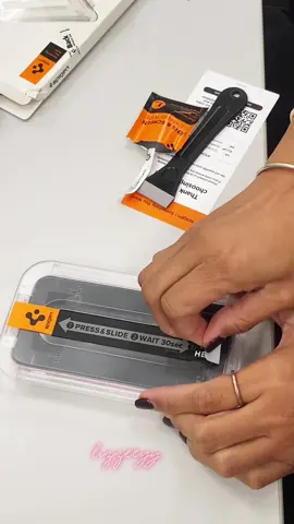 Putting Spigen EZ GLAStR EZ FIT on my iPhone 15 #iphone #spigen #temperedglass 